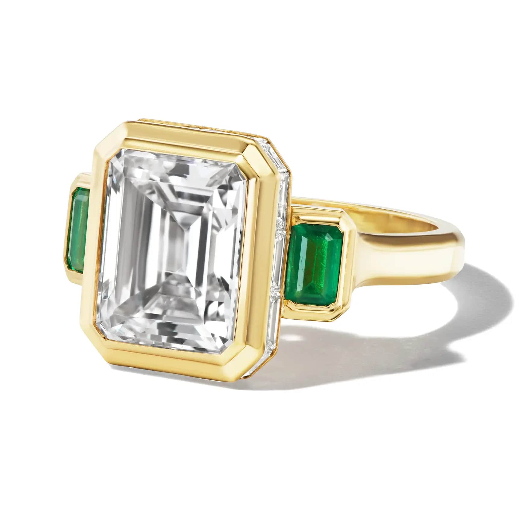 east-west-emerald-cut-bezel-set-ring