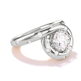 An angled shot of a Platinum Endless Loop Confetti Engagement Ring by Lindsey Scoggins Studio.