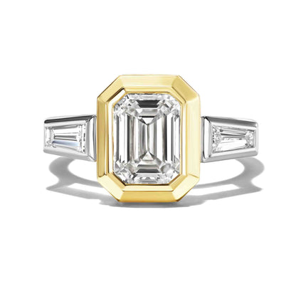 SHIELD BEZEL SET EMERALD CUT ENGAGEMENT RING WITH TAPERED BAGUETTES