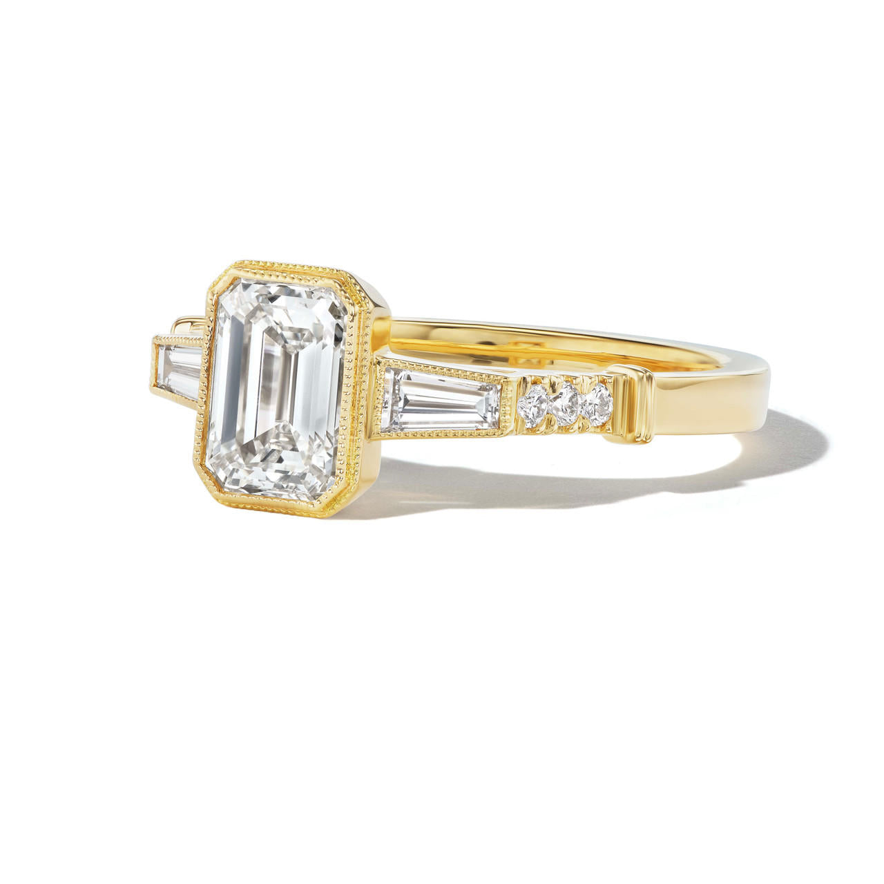 custom-emerald-cut-diamond-baguette-flank-engagement-ring