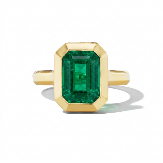 SHIELD BEZEL SET EMERALD CUT EMERALD RING