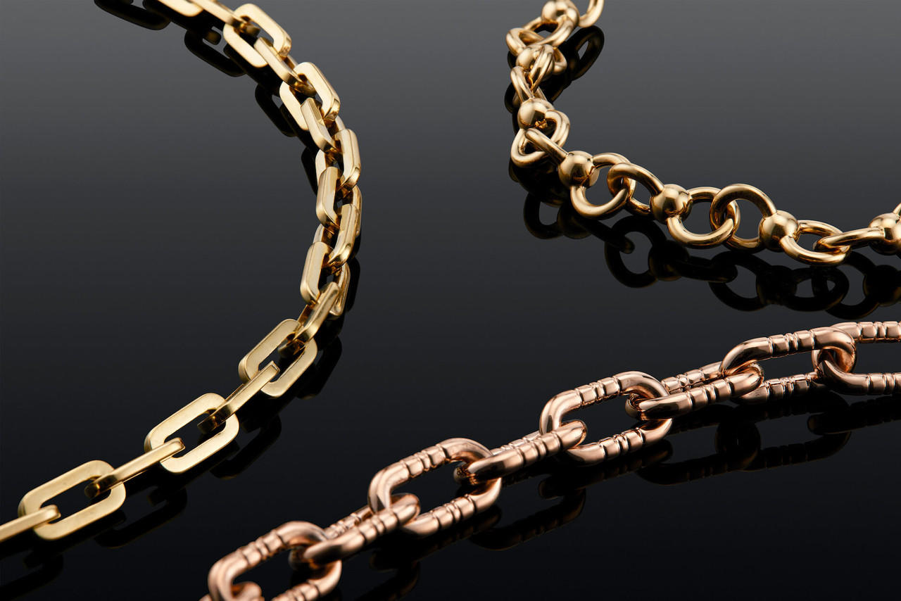 twisted infinity ball and chain necklace in 18 karat gold; gold ball chain necklace