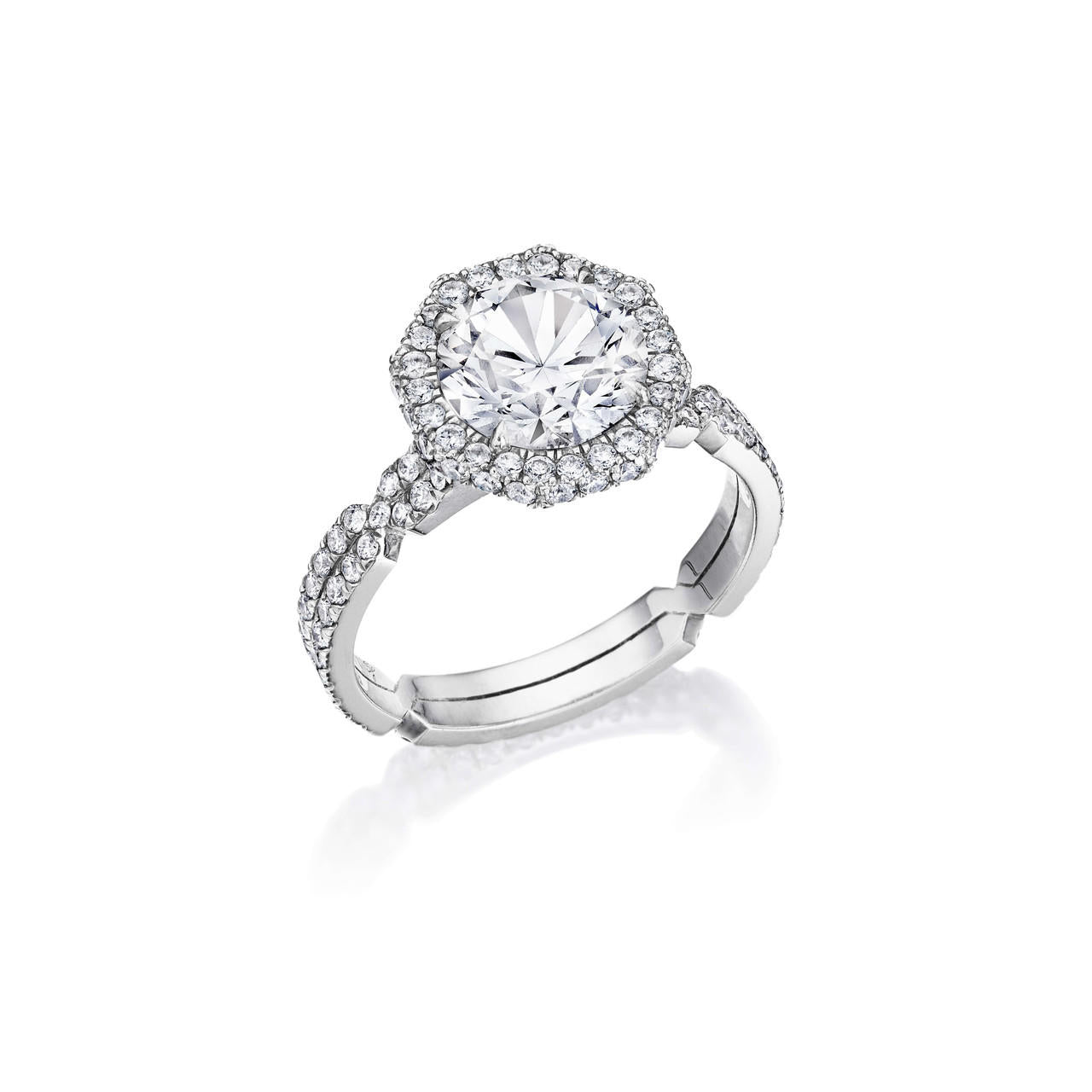 ROUND CUT DIAMOND ENGAGEMENT RING WITH AN OCTAGON HALO CHANCE PAVE SETTING IN PLATINUM