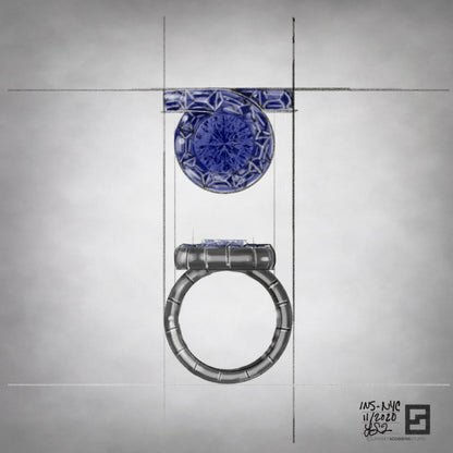 diamond and sapphire engagement ring with custom cut sapphire baguettes and a round center diamond set in 18 karat white gold and plated with dark rhodium