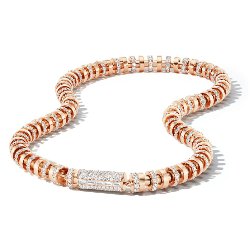 Pave diamond reverberations necklace with overlapping curved diamond links on a white background.