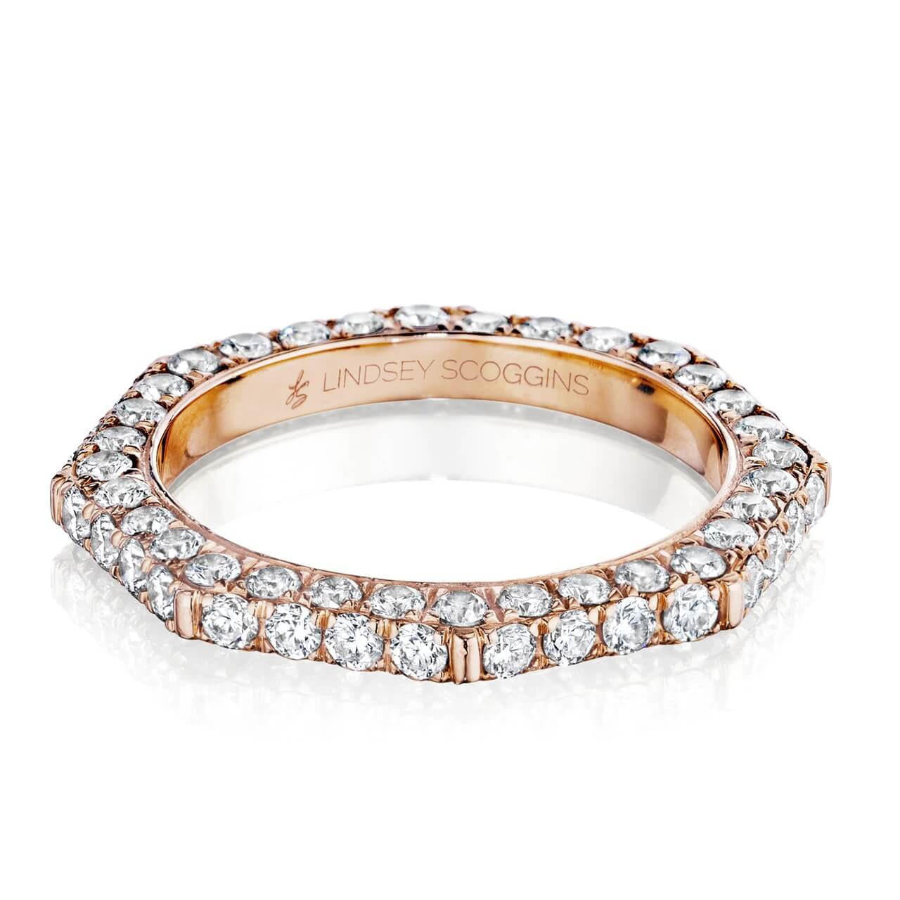 Pave diamond wedding band in 18 karat rose gold