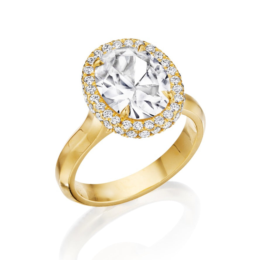 oval halo engagement ring yellow gold