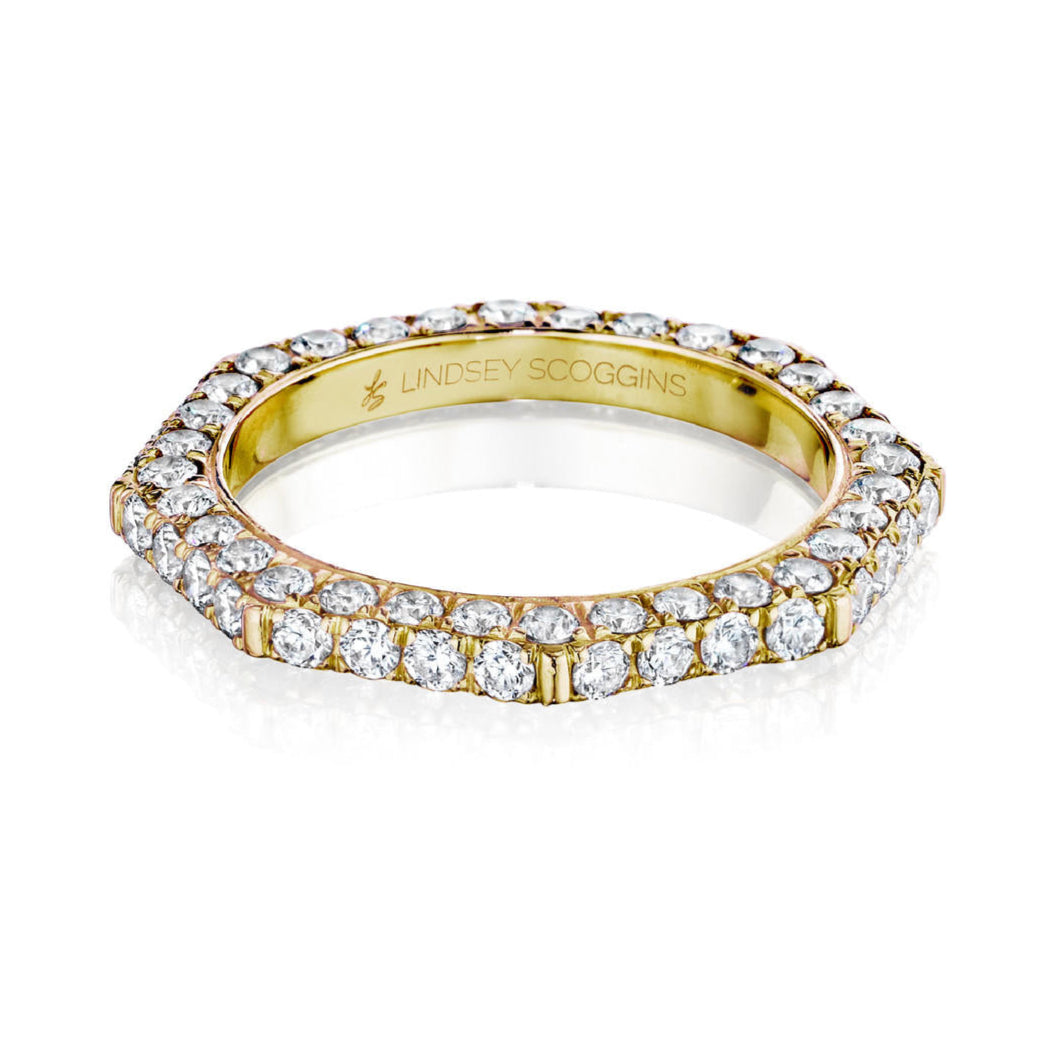 Pave diamond wedding band in 18 karat yellow gold