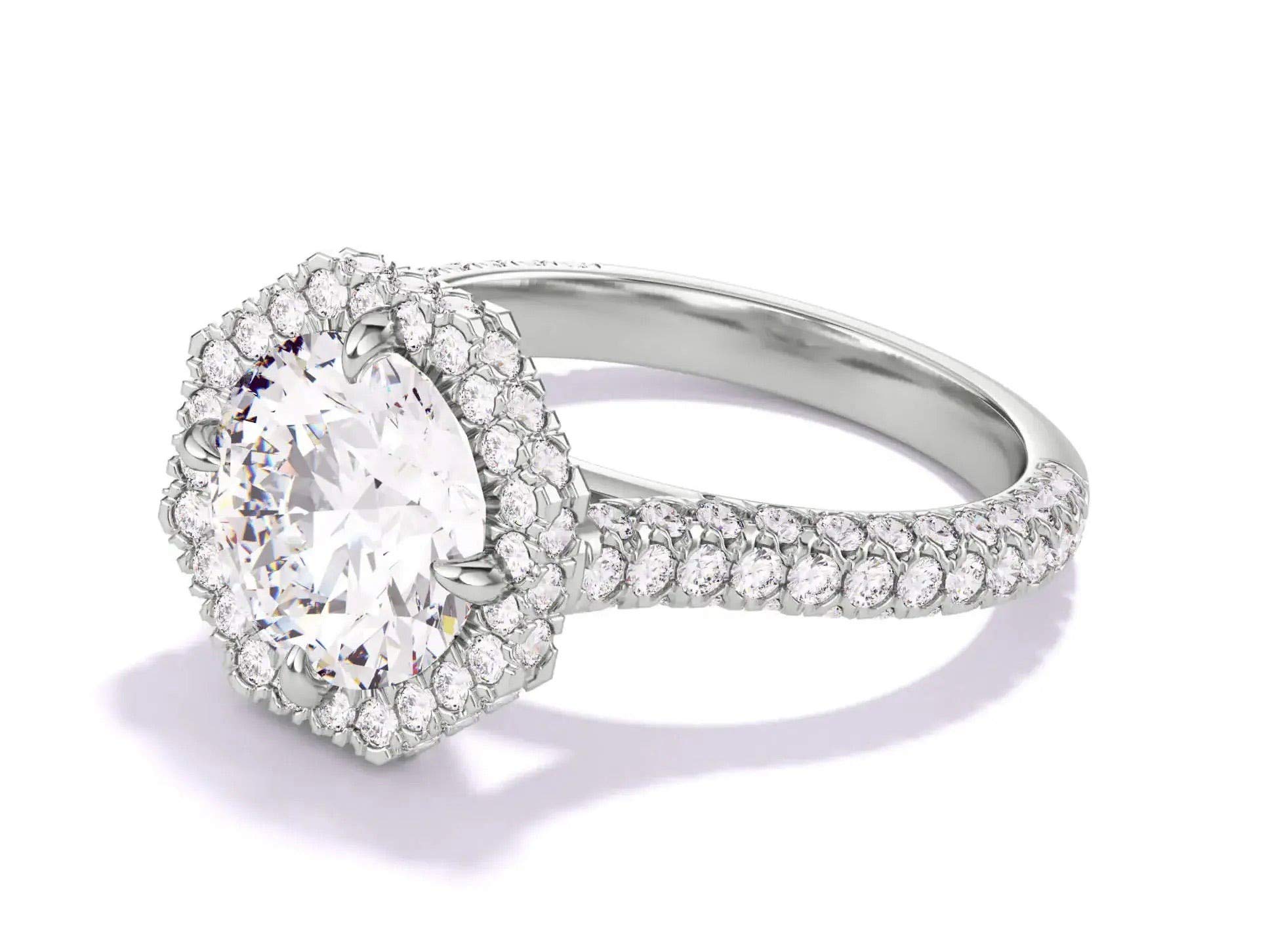 Round cut diamond engagement ring with an octagon halo
