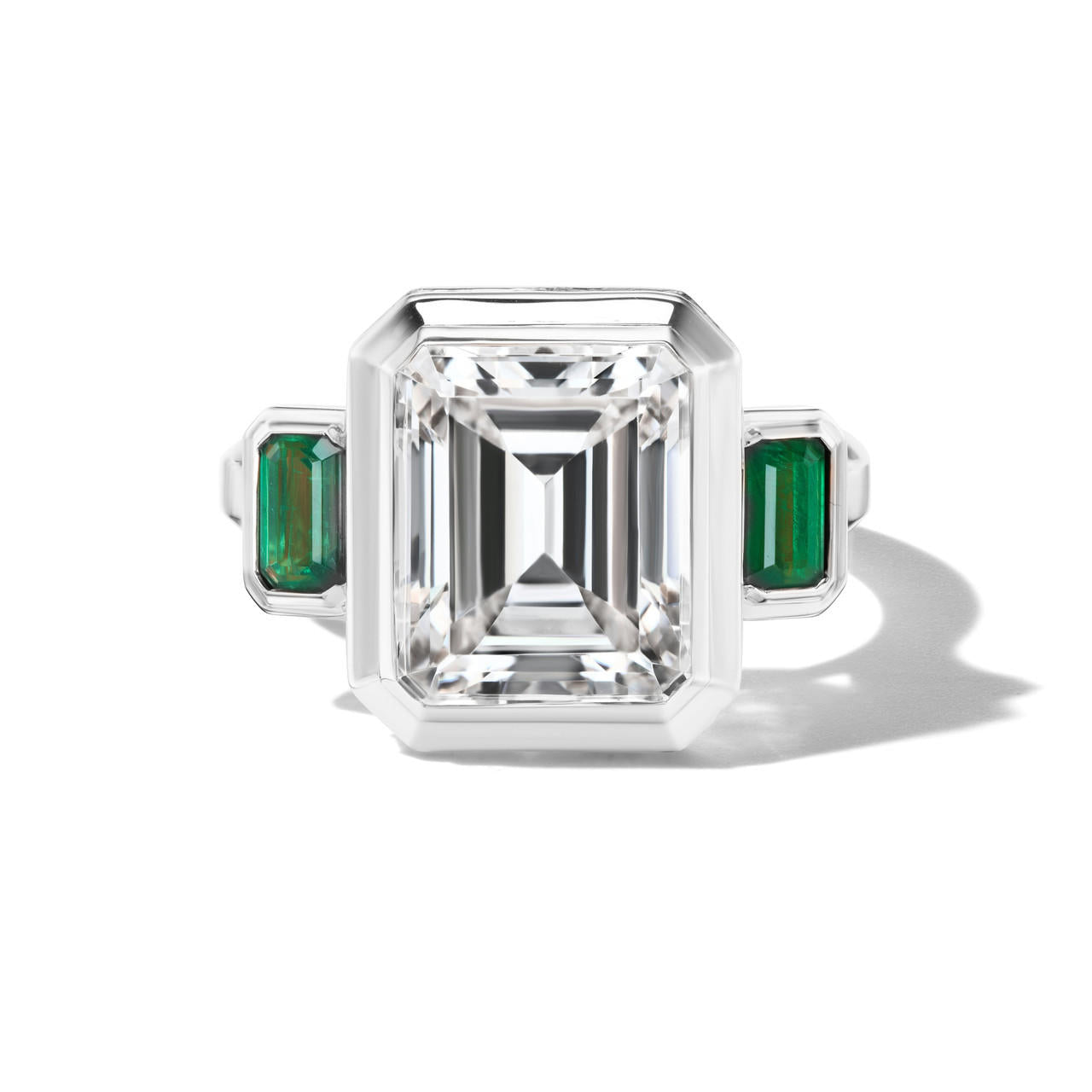 shield emerald cut diamond three stone ring in platinum