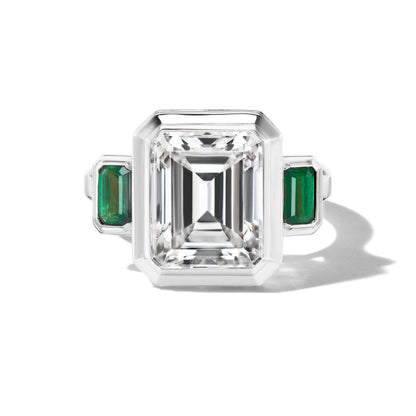 SHIELD EMERALD CUT DIAMOND THREE STONE RING IN PLATINUM