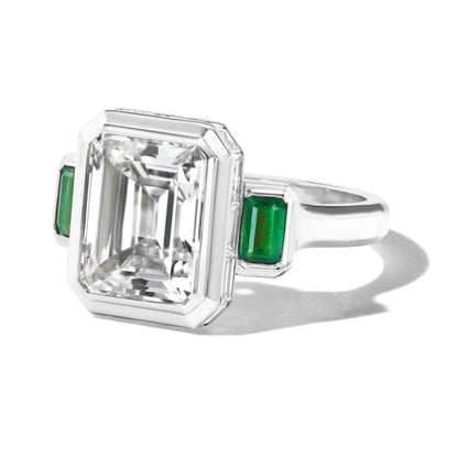 SHIELD EMERALD CUT DIAMOND THREE STONE RING IN PLATINUM