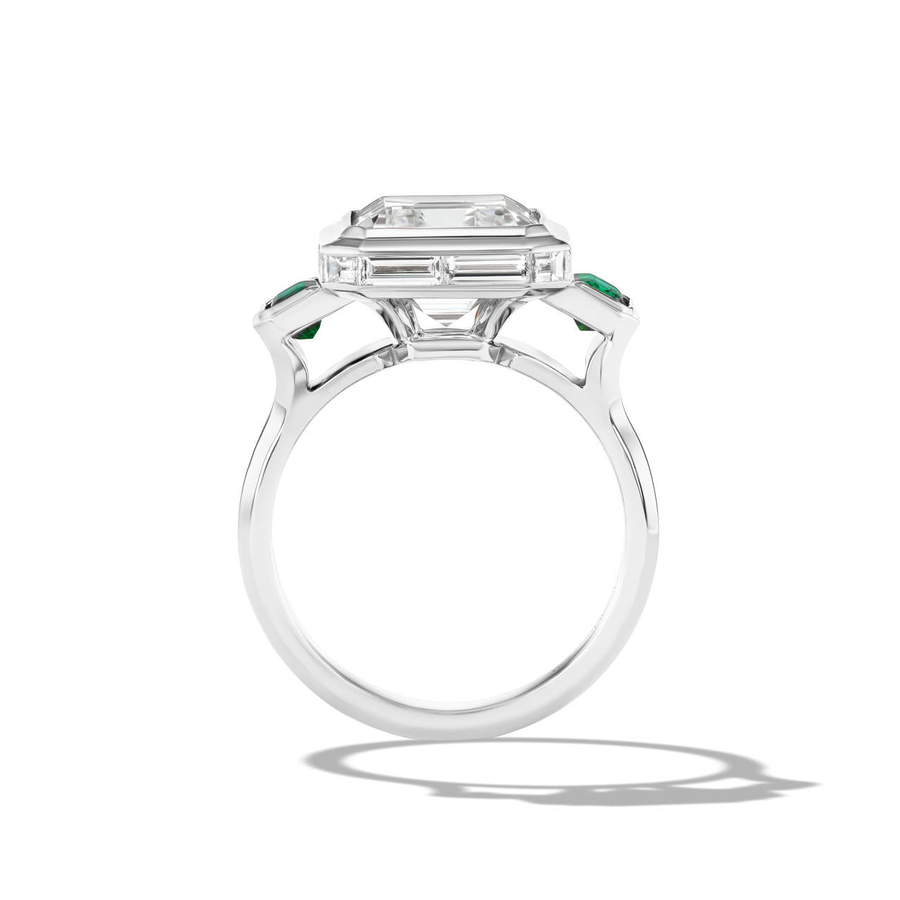 shield emerald cut diamond three stone ring in platinum