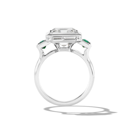 SHIELD EMERALD CUT DIAMOND THREE STONE RING IN PLATINUM