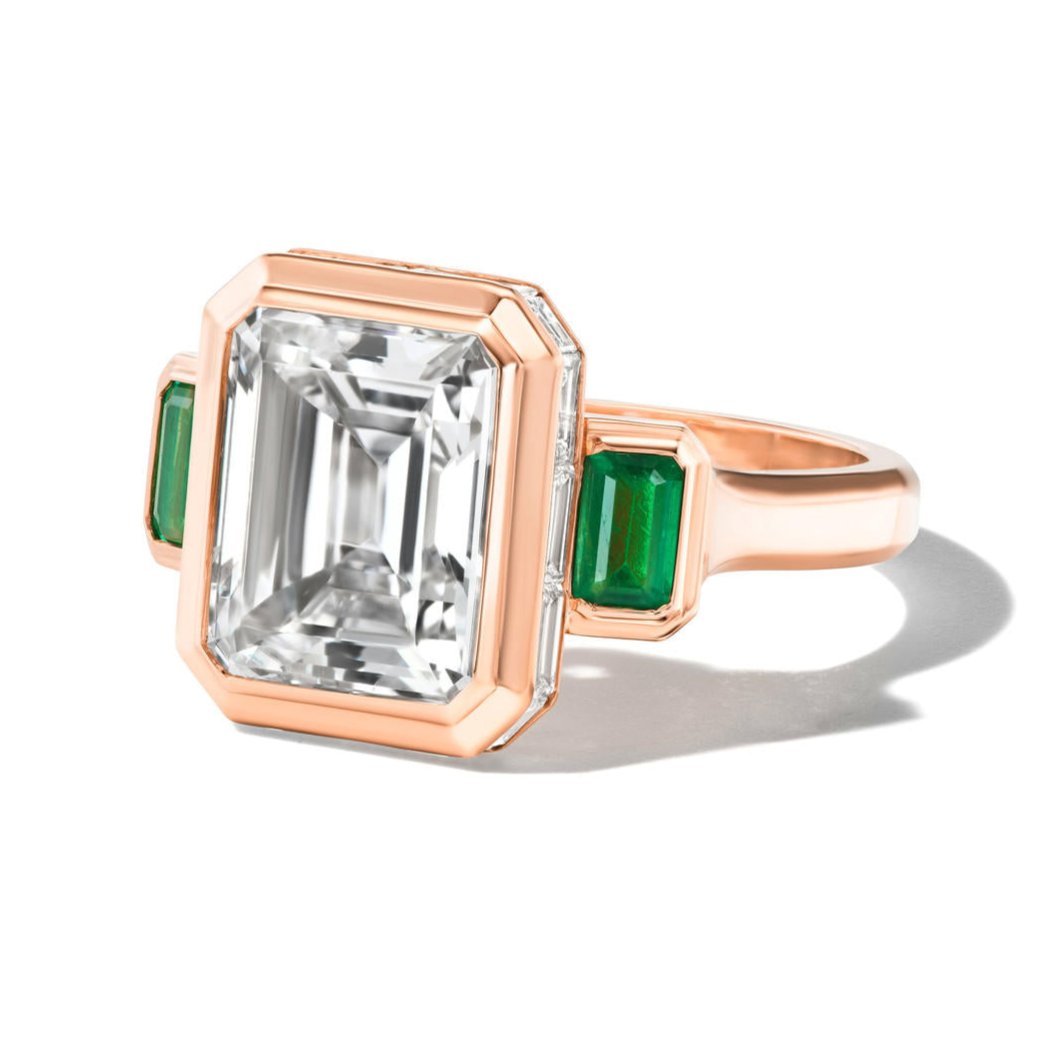 shield emerald cut diamond three stone ring in 18k rose gold