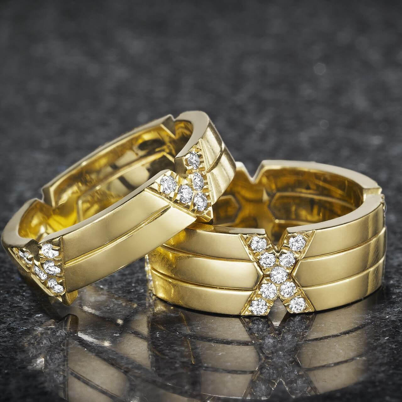 TIME collection bands; 18 karat yellow gold and diamond V ring