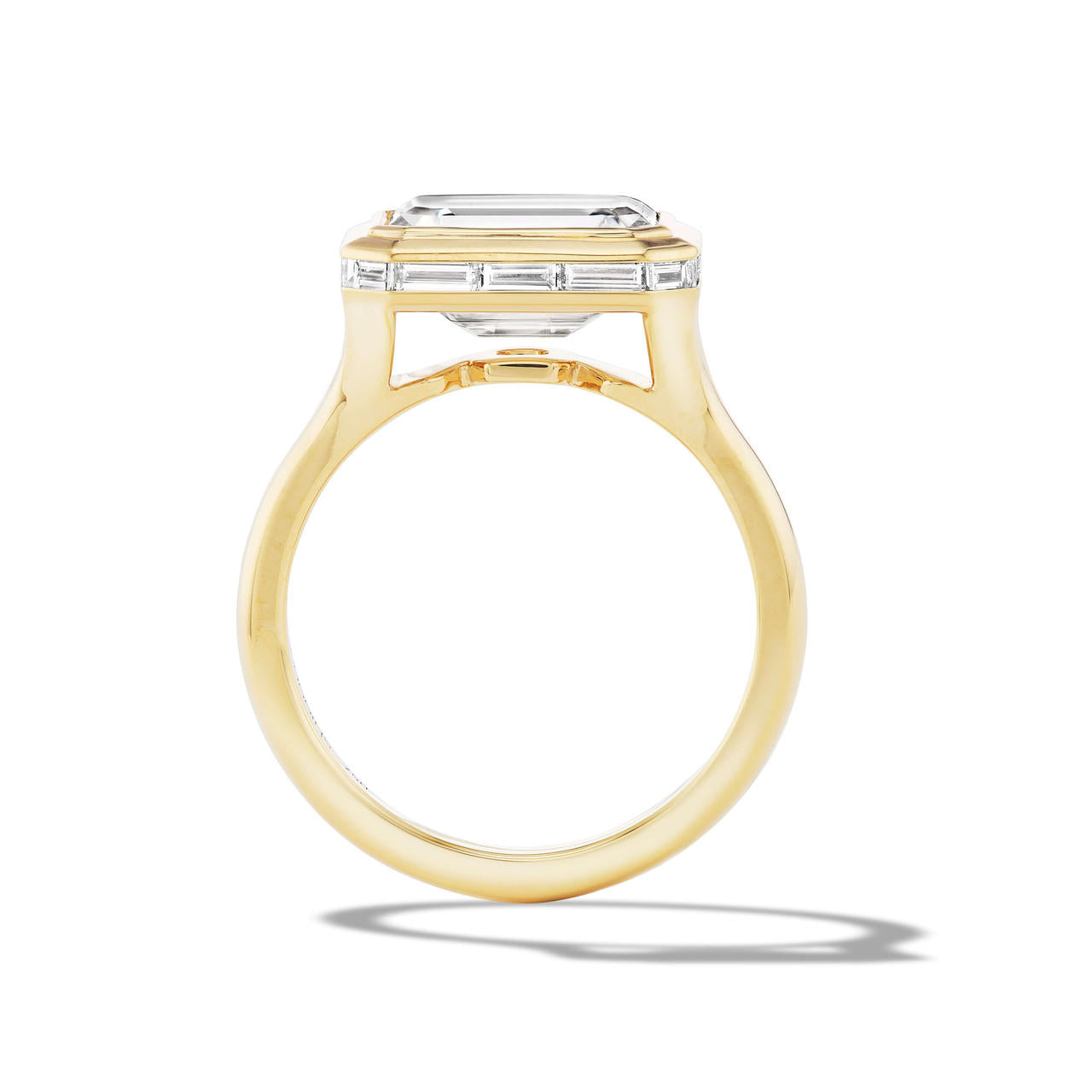Bezel set east west emerald cut diamond ring