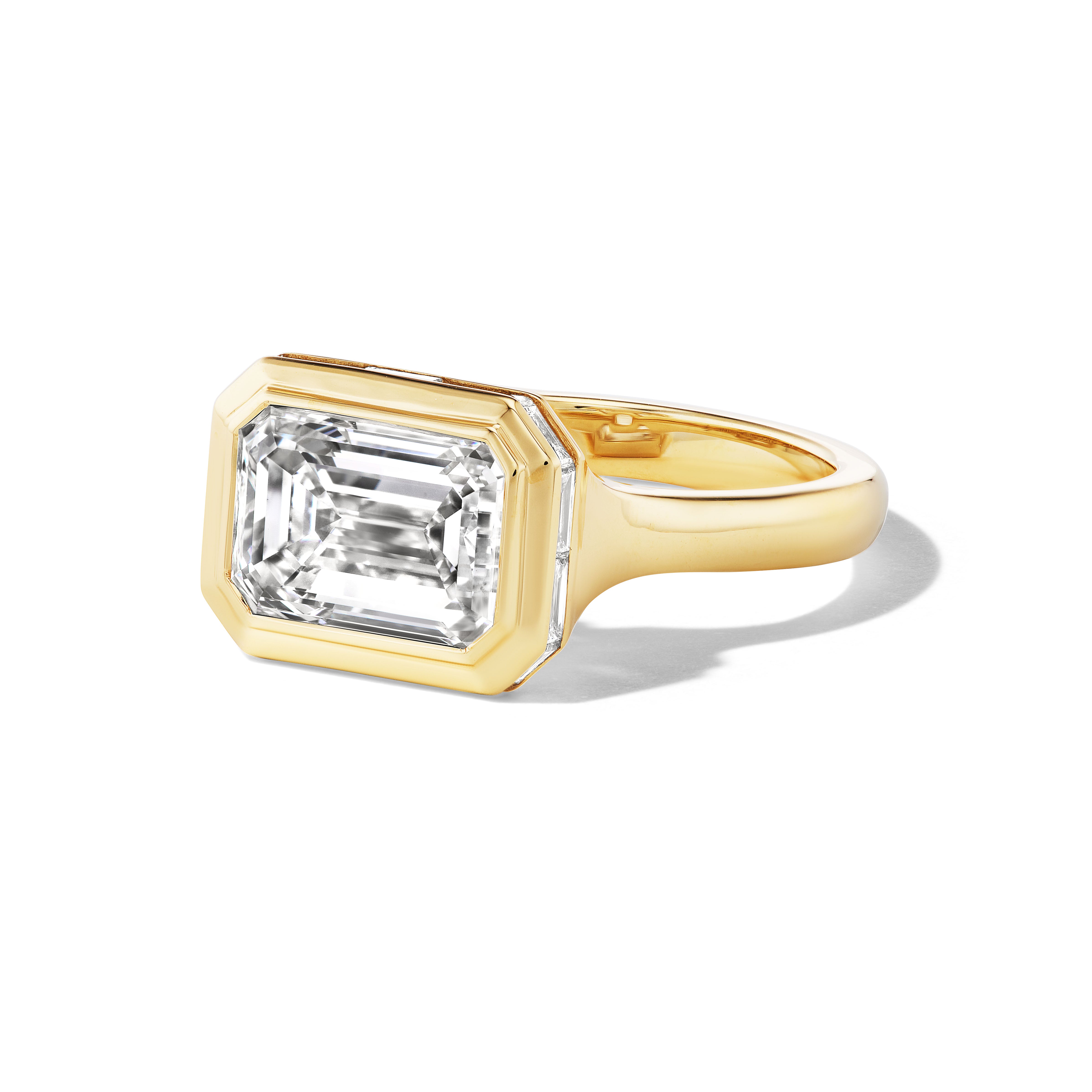 EAST WEST ENGAGEMENT RING WITH HALO