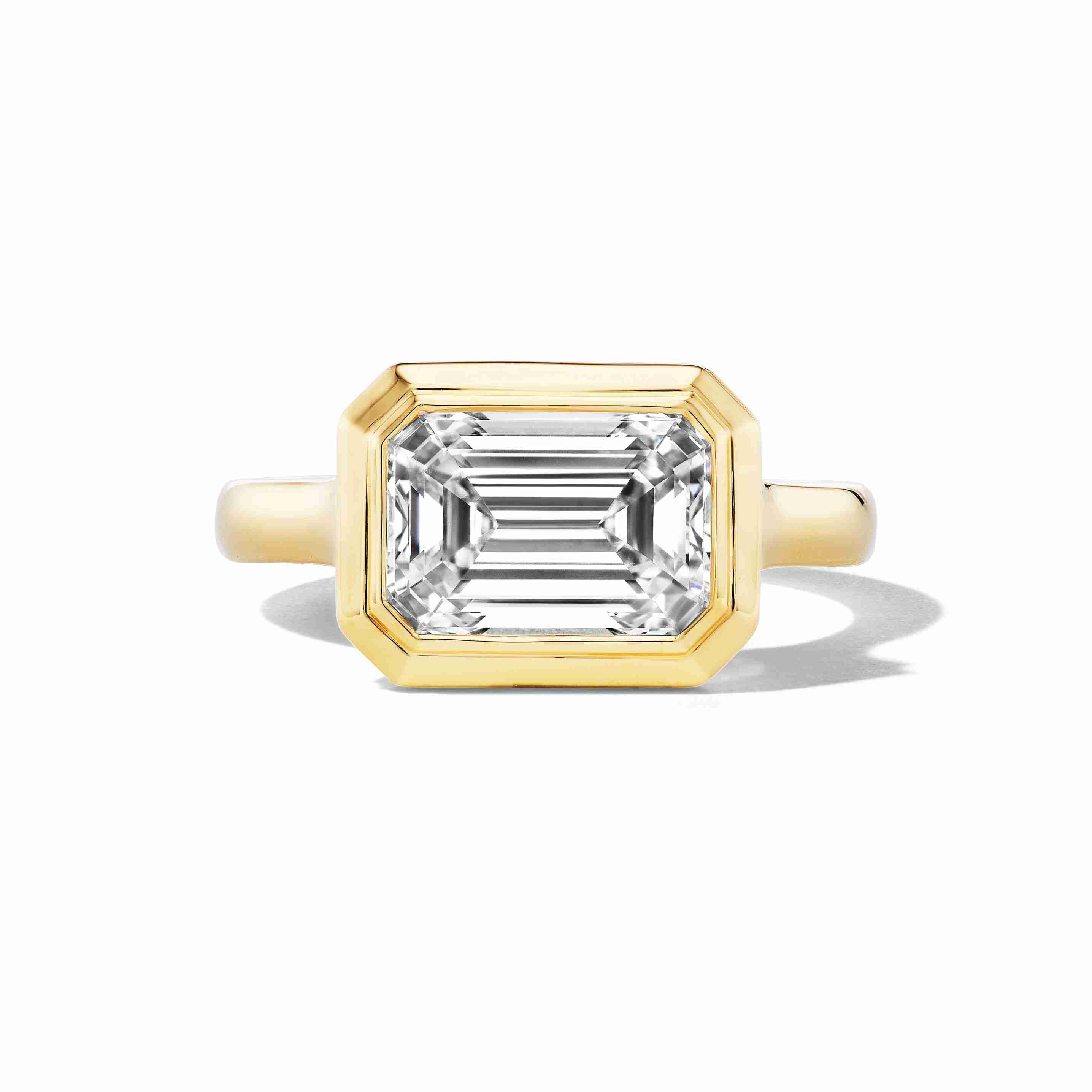 EAST WEST ENGAGEMENT RING WITH HALO