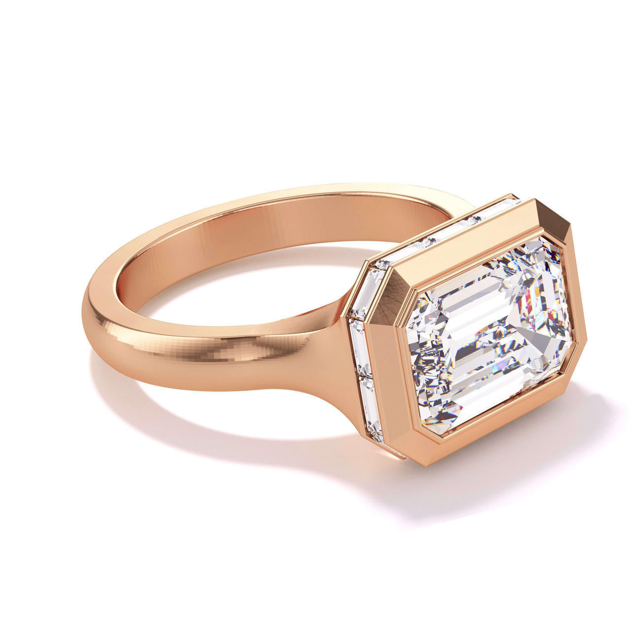 shield bezel set east west emerald cut engagement ring with halo in 18k rose gold