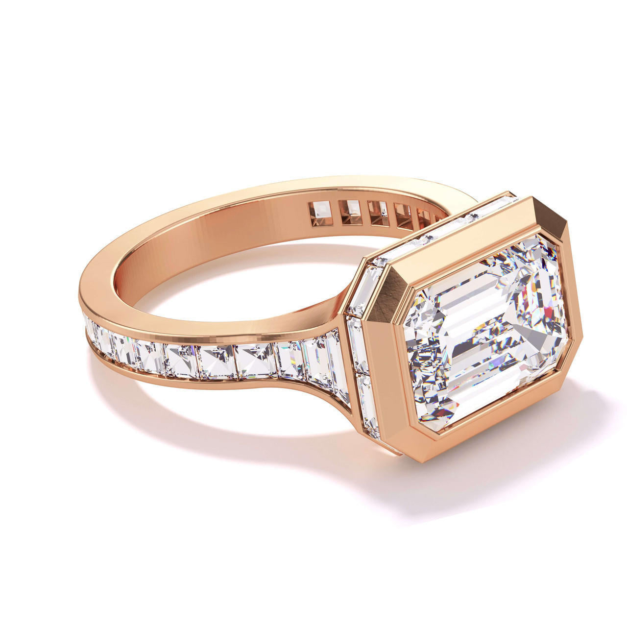 SHIELD BEZEL SET EAST WEST EMERALD CUT ENGAGEMENT RING WITH BAGUETTE DIAMOND HALO AND BAND IN 18K ROSE GOLD