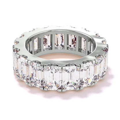 Emerald cut, baguette, and round diamond hinged bangle in platinum