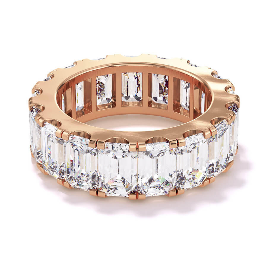 Emerald cut, baguette, and round diamond hinged bangle in 18 karat rose gold