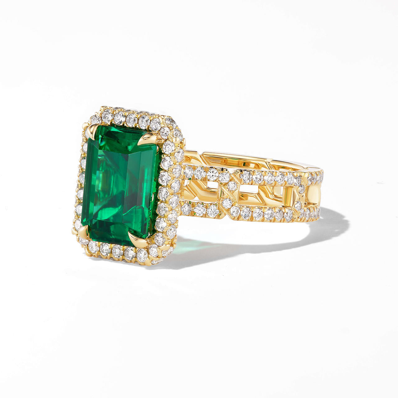 EMERALD CUT DIAMOND ENGAGEMENT RING WITH A WRAPPED HALO 8 PAVE LINKS SETTING IN 18K YELLOW GOLD