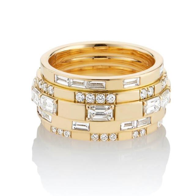 tiered eternity band with emerald cut diamonds and baguette diamonds in 18 karat yellow gold