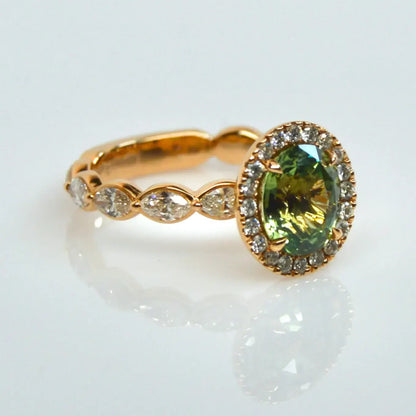 BESPOKE GREEN SAPPHIRE AND DIAMOND ENGAGEMENT RING