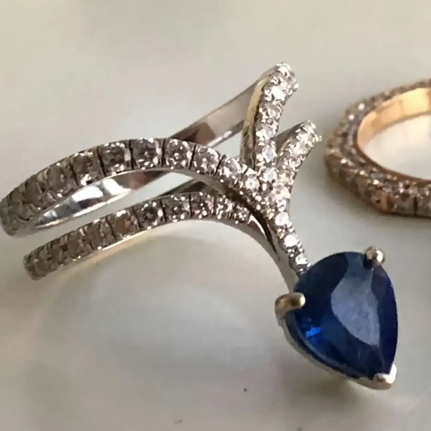 BESPOKE PEAR SHAPED SAPPHIRE AND DIAMOND RING