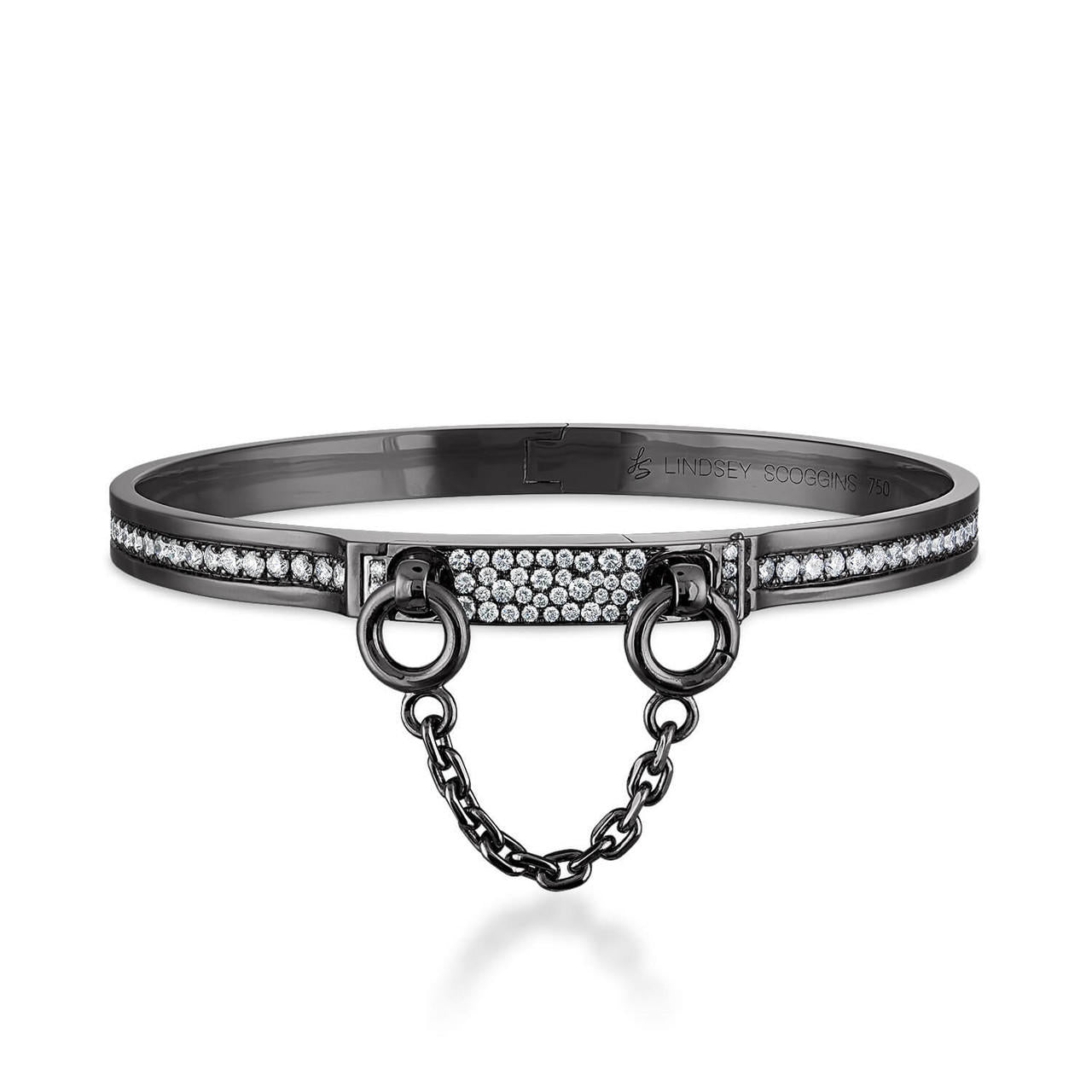 Oath single cuff with pave diamond row and pave latch in blackened gold