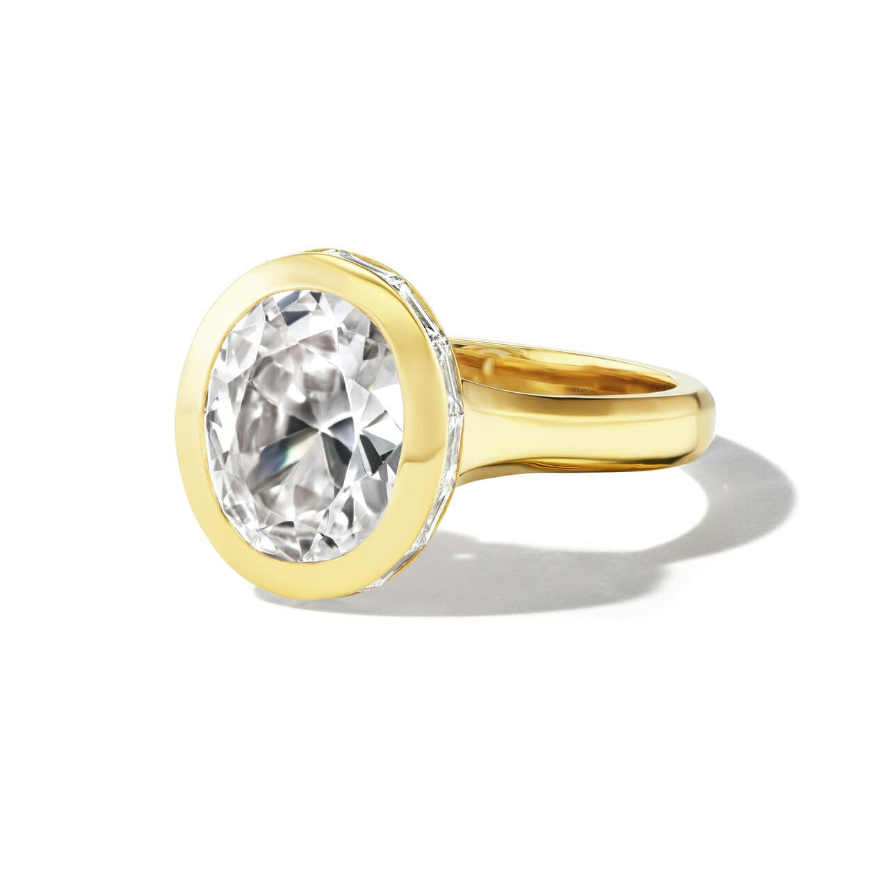 bezel-set-oval-diamond-ring-yellow-gold