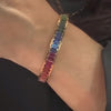 Close-up of a person’s wrist wearing the ‘Note to Self’ Multicolored Tourmaline Bangle by Lindsey Scoggins Studio.