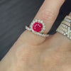 Lindsey Scoggins Studio’s Ruby Endless Loop Ring, modeled on a hand. 