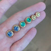 Lindsey Scoggins Studio’s Oath Collection Stud earring, shown on a hand.