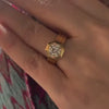 A Shield Octagon Bezel Set Round Diamond Ring modeled on a hand.