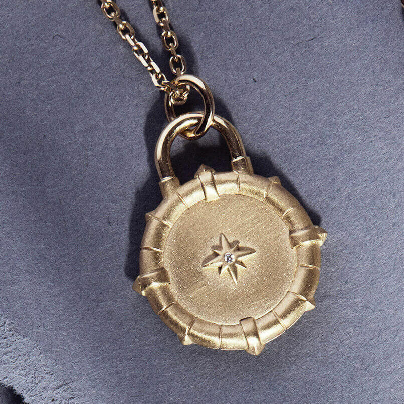 The FINDER diamond pendant front view